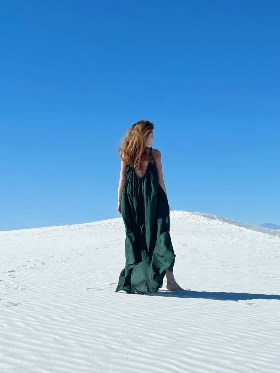 Model wearing the Green Backless Maxi Dress, oversized dress, dark green dress, perfect for beach dress or resort dress- slow fashion by coco de chpm