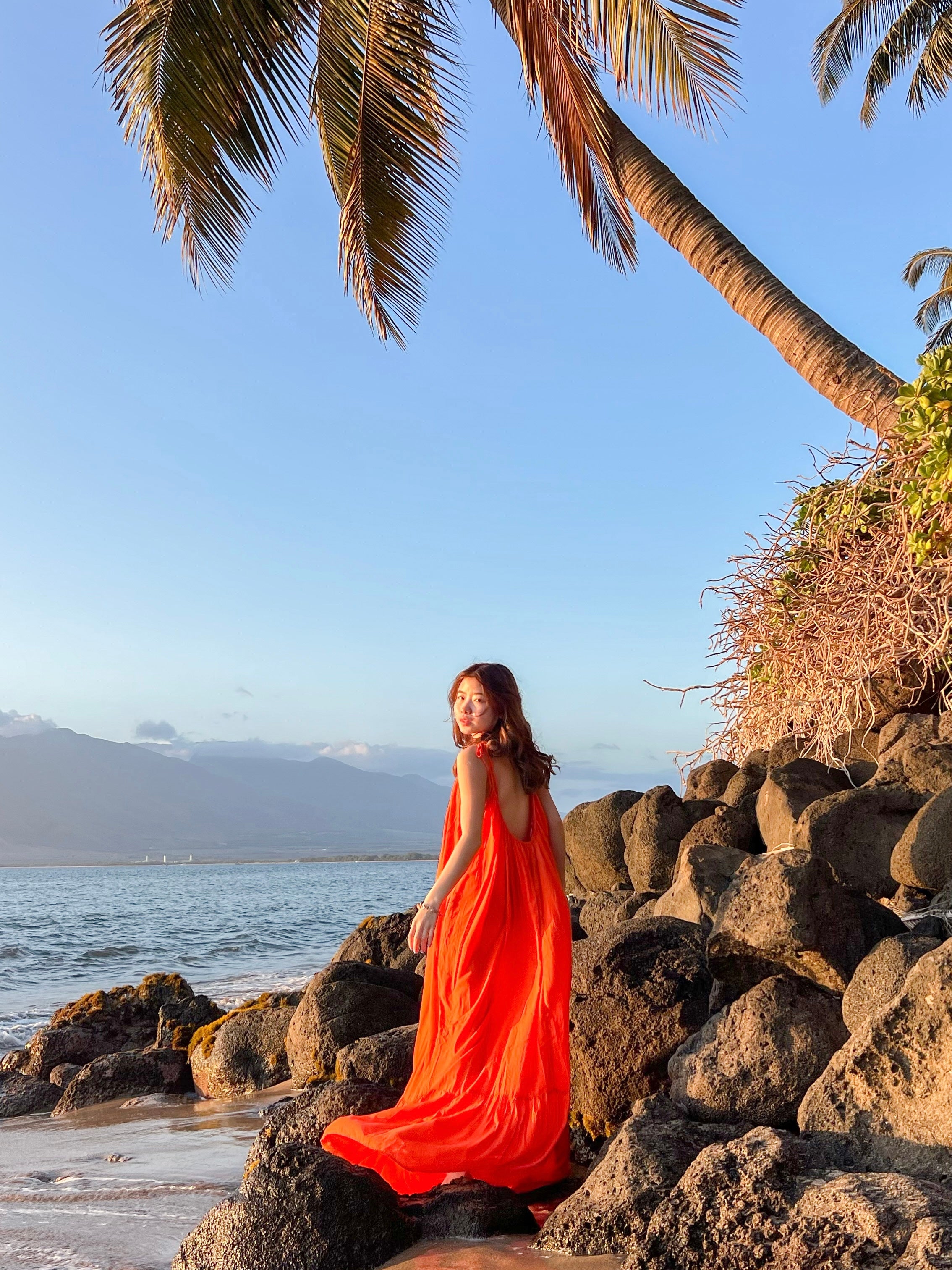 Unleash your inner fashionista with our Orange Backless Maxi Dress from Mali Dress Collection